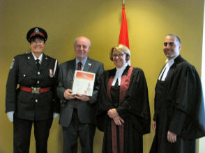 Alastair with the Judge, Police office and Clerk